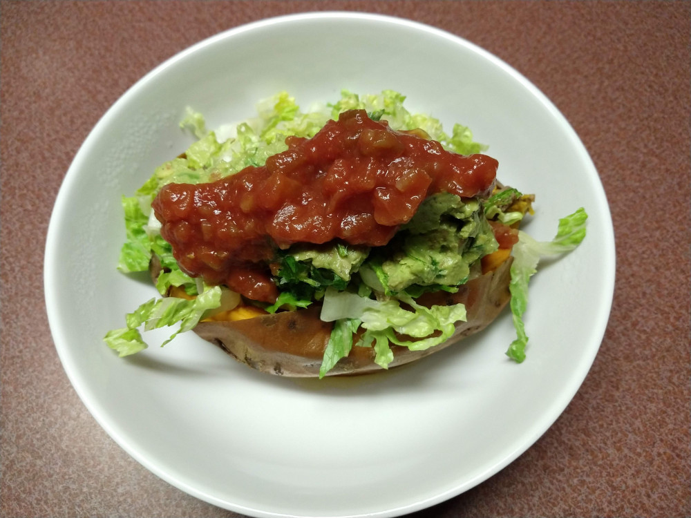 Loaded baked sweet potato w/ salsa